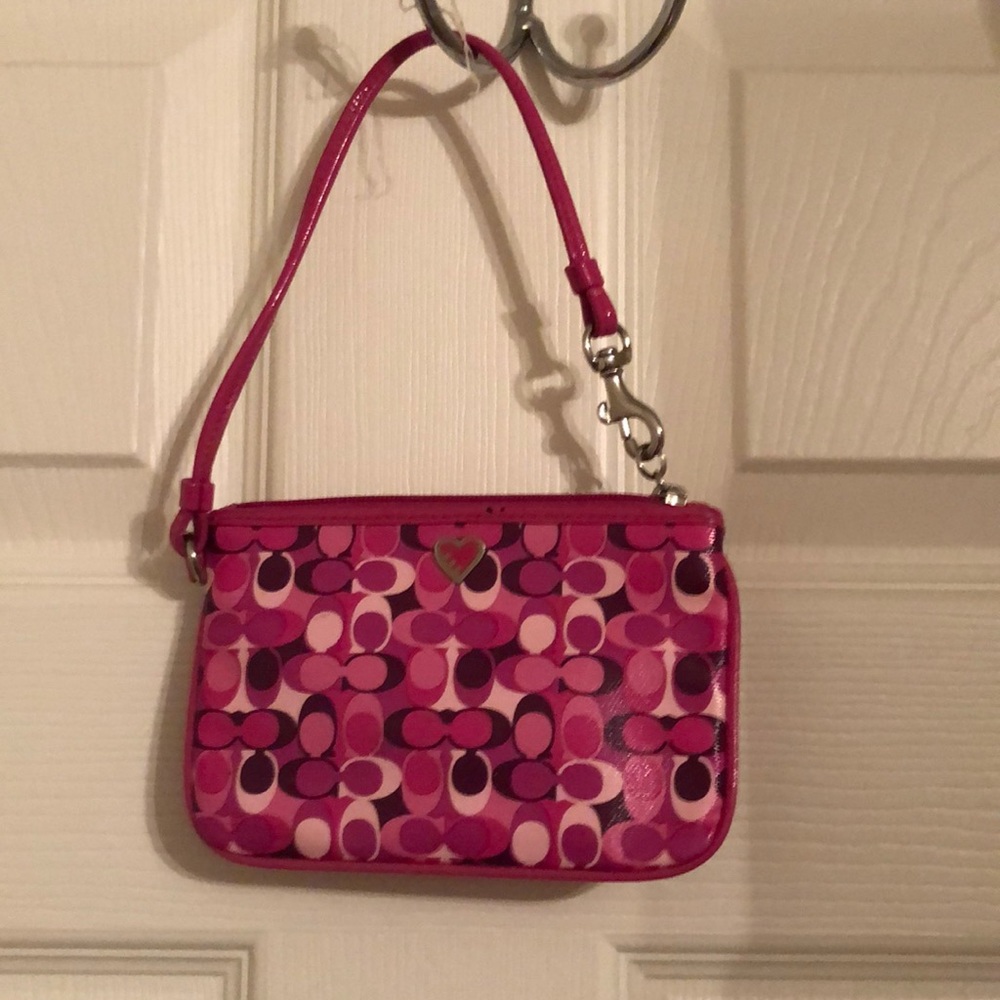 Pink coach wristlet